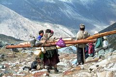 11 Chatting With Some Local Villagers Carrying Logs As We NEar The Camp Below Shao La Tibet.jpg